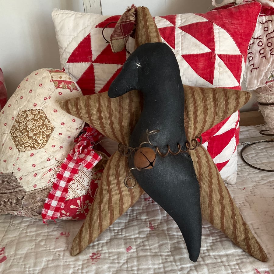 Primitive crow on a star