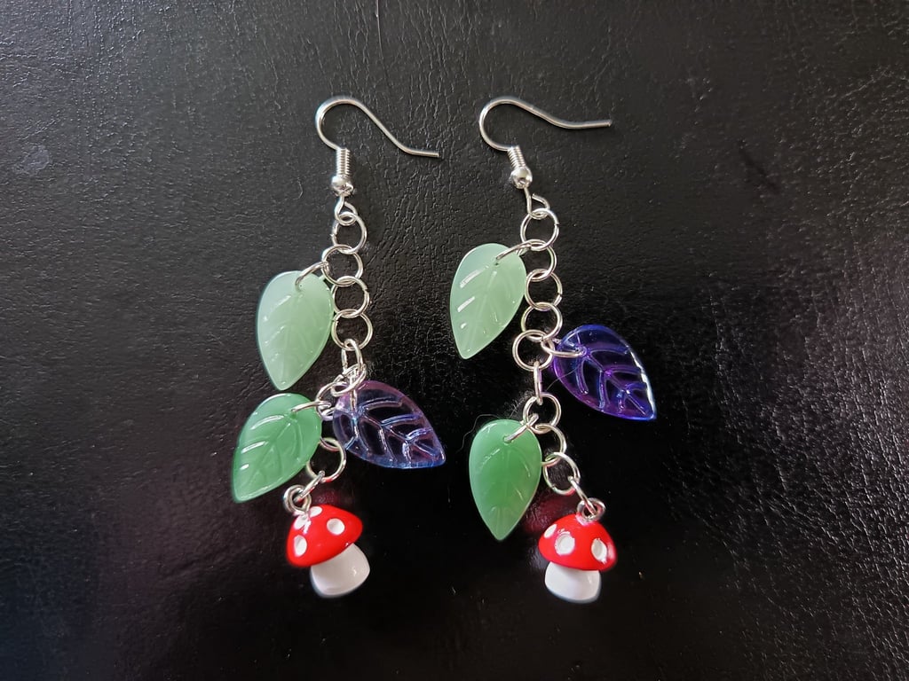 Cottagecore red and white toadstool charm leafy dangle earrings 