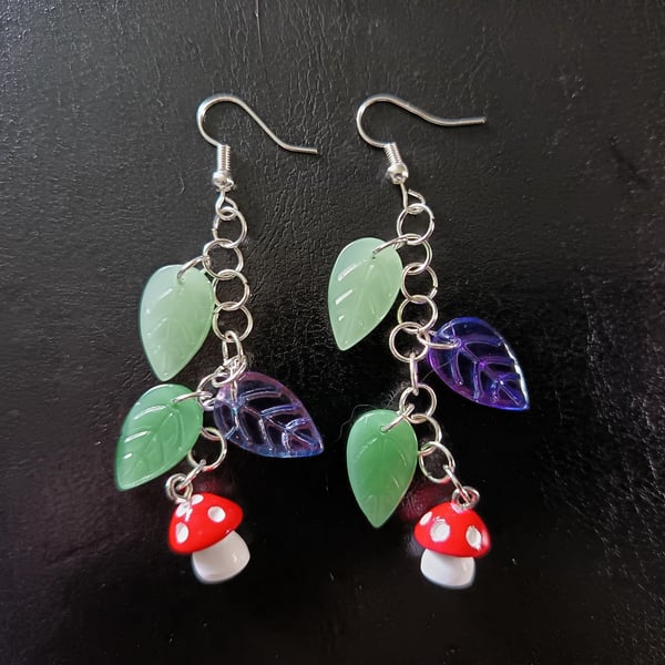 Cottagecore red and white toadstool charm leafy dangle earrings 