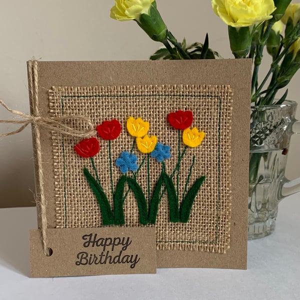 Birthday card. Bright red, yellow and blue flowers. Wool felt. Handmade Card.