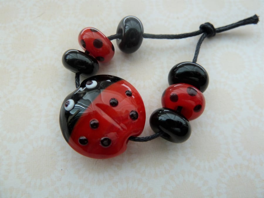 handmade lampwork glass ladybird bead set