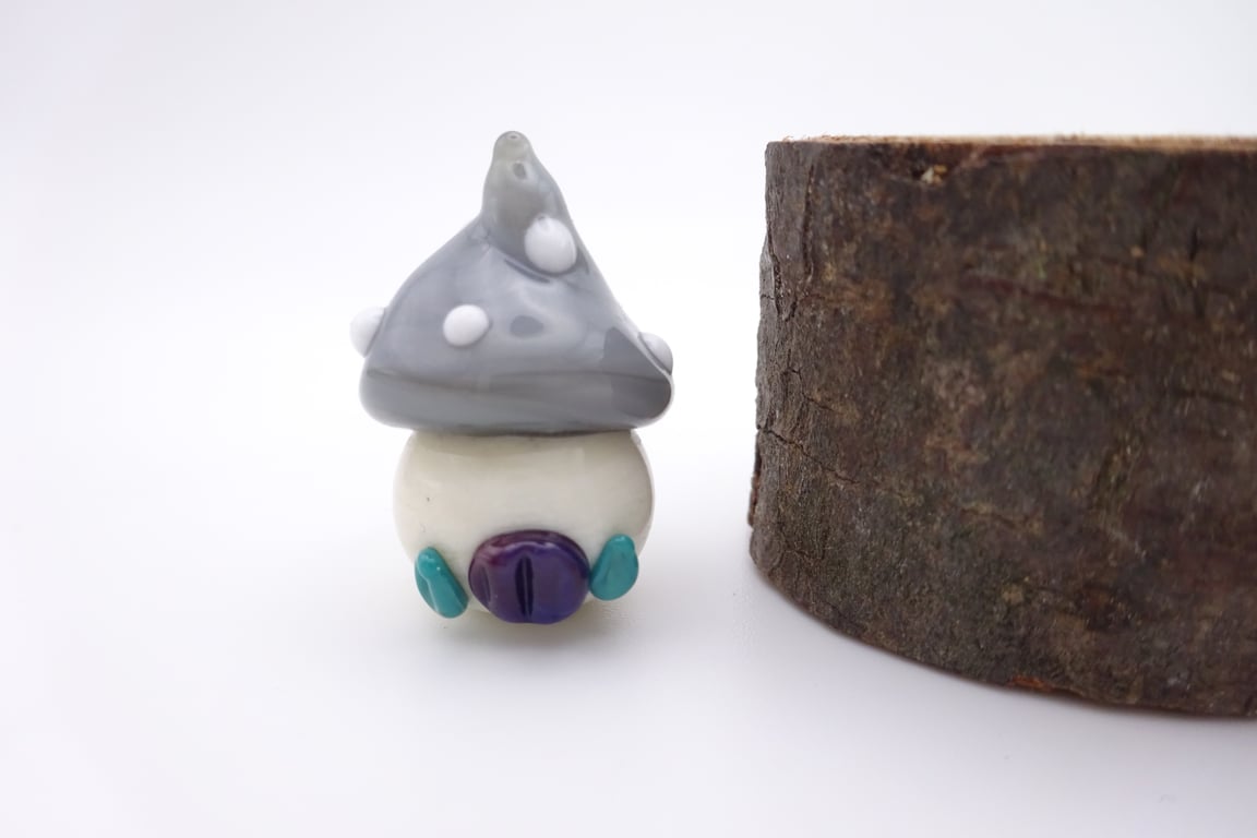 small glass toadstool house