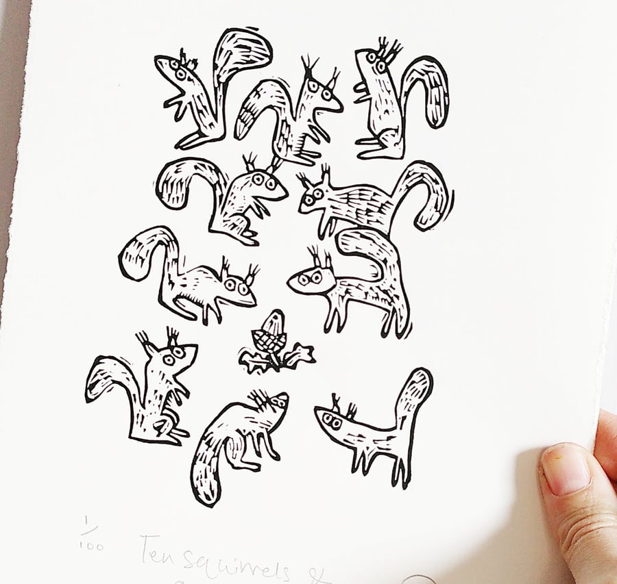 Ten Squirrels and an acorn - lino cut print