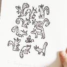 Ten Squirrels and an acorn - lino cut print
