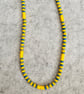 Yellow and beaded necklace