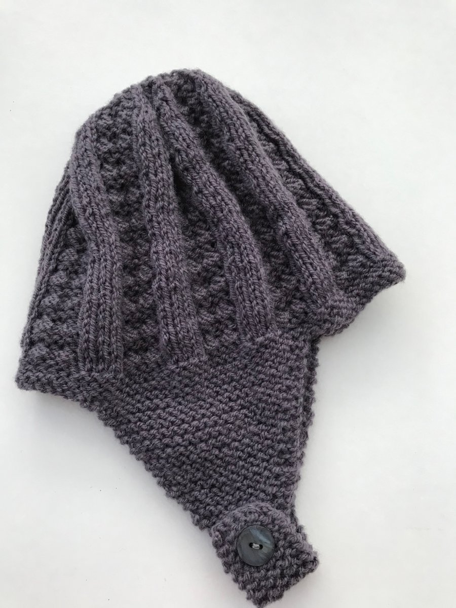 Hand knitted baby hat with earflaps