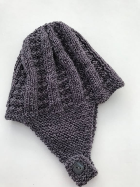 Hand knitted baby hat with earflaps