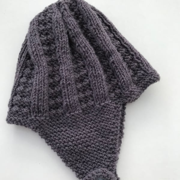 Hand knitted baby hat with earflaps