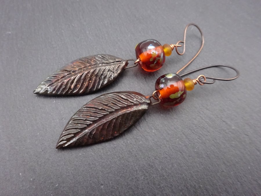 lampwork glass amber earrings, ceramic leaf and copper