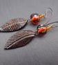 lampwork glass amber earrings, ceramic leaf and copper