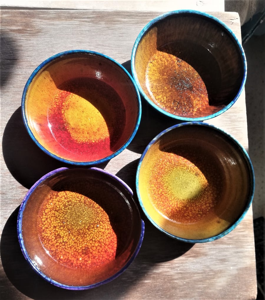 Vibrant orange and blue ceramic soup or cereal bowls