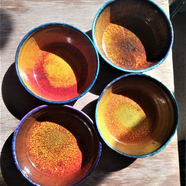 Vibrant orange and blue ceramic soup or cereal bowls