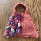Orange crochet handbag, with an autumnal theme and theme 