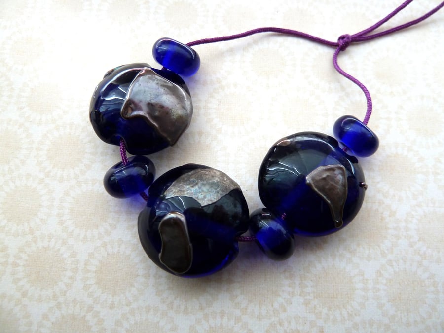 handmade lampwork blue beads