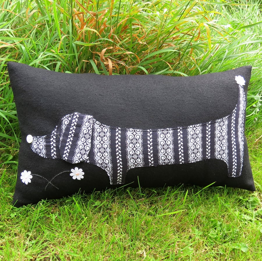 A snoozy groovy dachshund cushion.  With inner cushion pad.