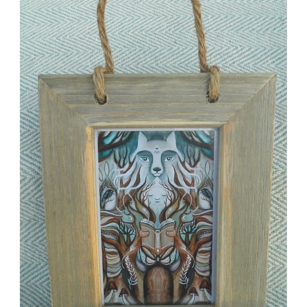 Small wolf print in driftwood frame