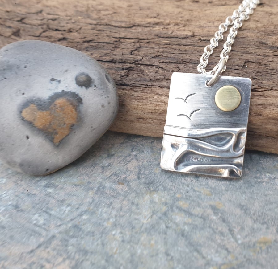 Silver beach, sea coast pendant, with brass sun and seagulls