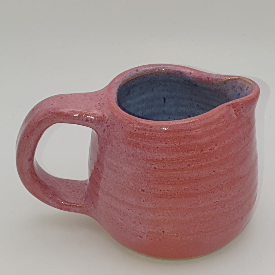 Pink milk jug