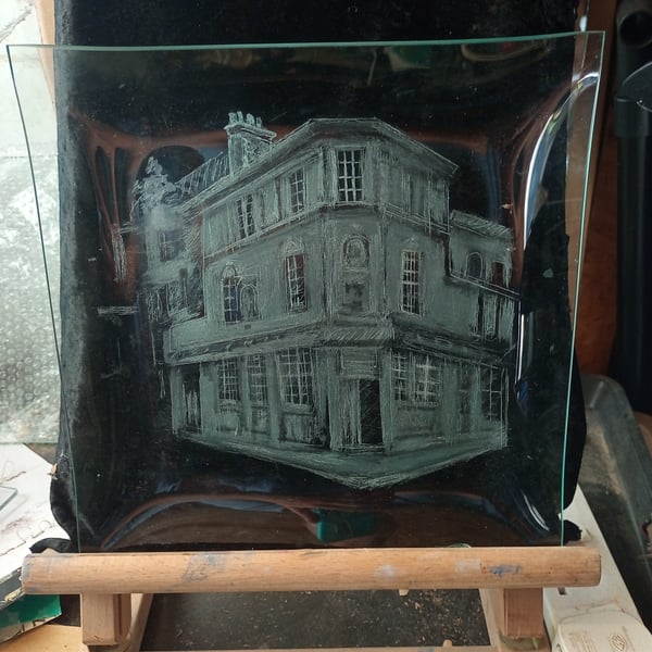 Portrait of your business premises on glass