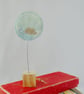 Embroidered Raincloud fabric ornament on wooden block - Image 1