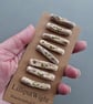 Set of eight small driftwood toggle buttons - Image 1