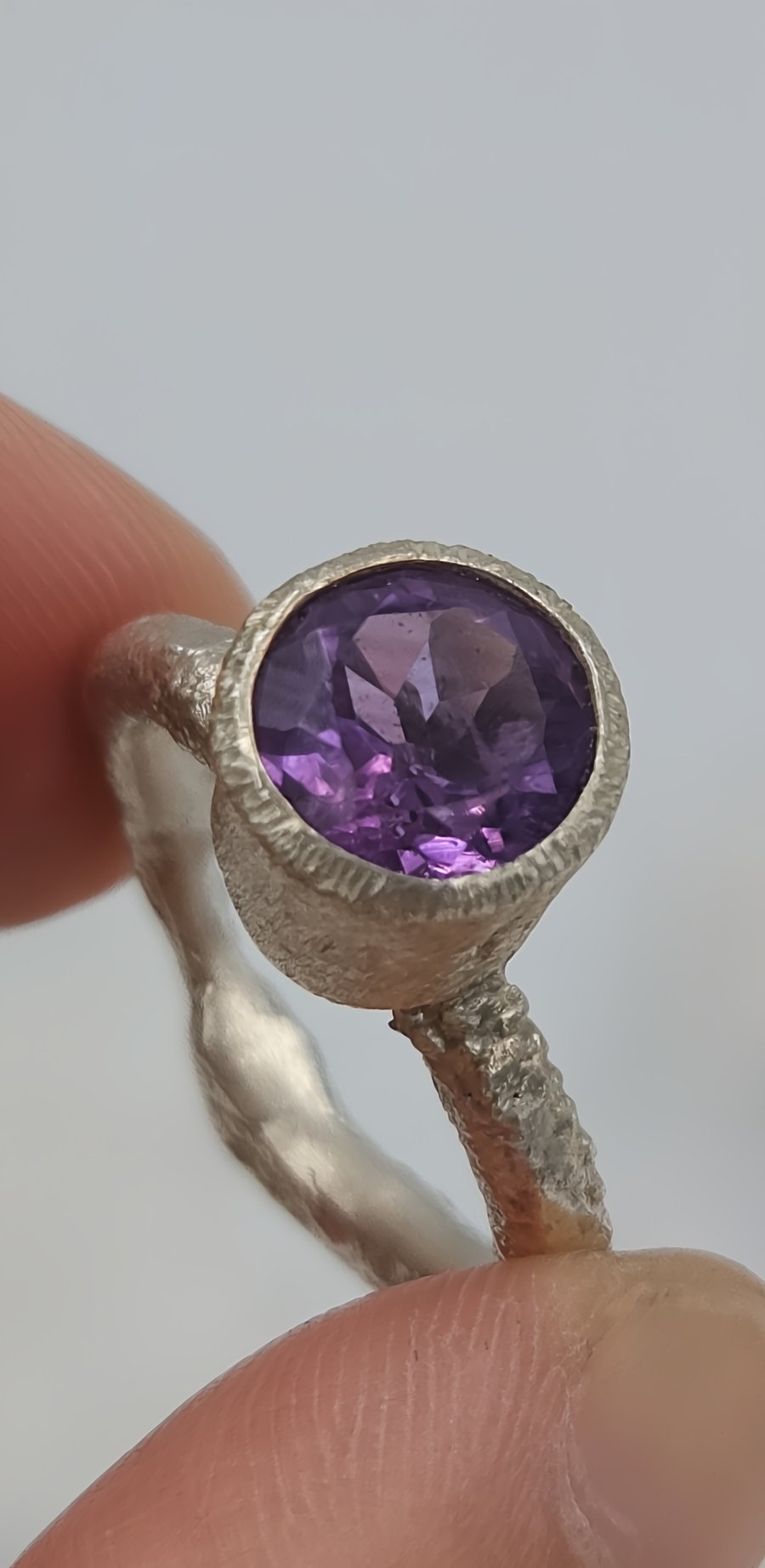 Forged Silver Ring with Faceted Purple Amethyst