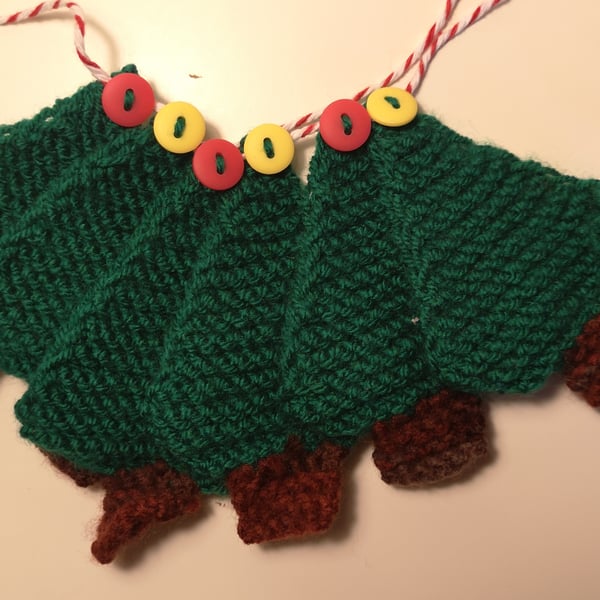 Knitted Christmas tree bunting with matte red and yellow buttons