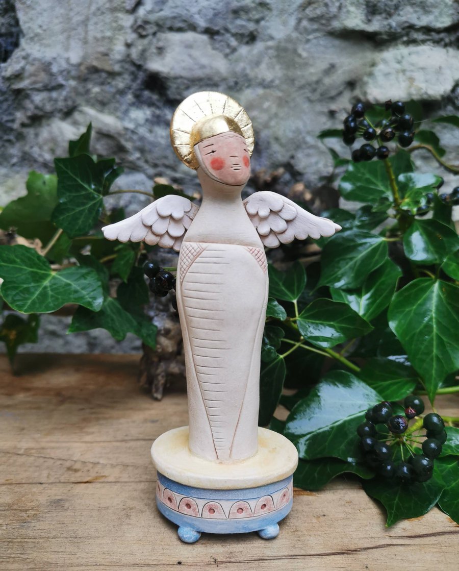 Ceramic Angel Sculpture-Stoneware ceramic Angel figure on blue podium