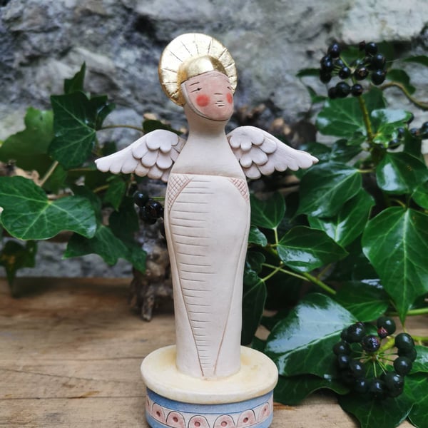 Ceramic Angel Sculpture-Stoneware ceramic Angel figure on blue podium