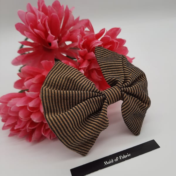 Hair bow slide clip in black and gold. 3 for 2 offer.  