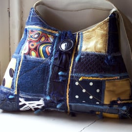 Soft fabric shoulder bag in blue and gold mixed fabrics
