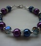WINE AND NAVY CRYSTAL RONDELLE BRACELET.  632 - Image 1
