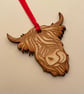 Etched wooden highland cow decoration