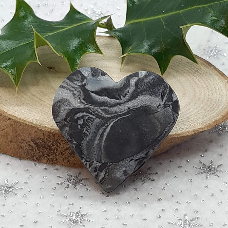 Black and silver heart shaped brooch