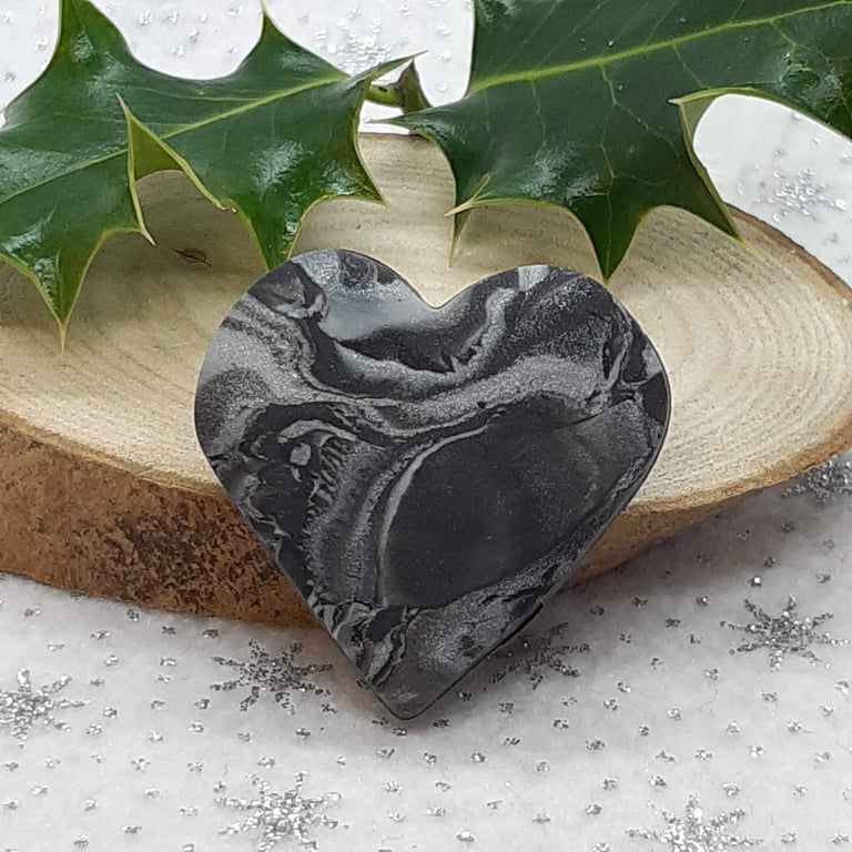 Black and silver heart shaped brooch