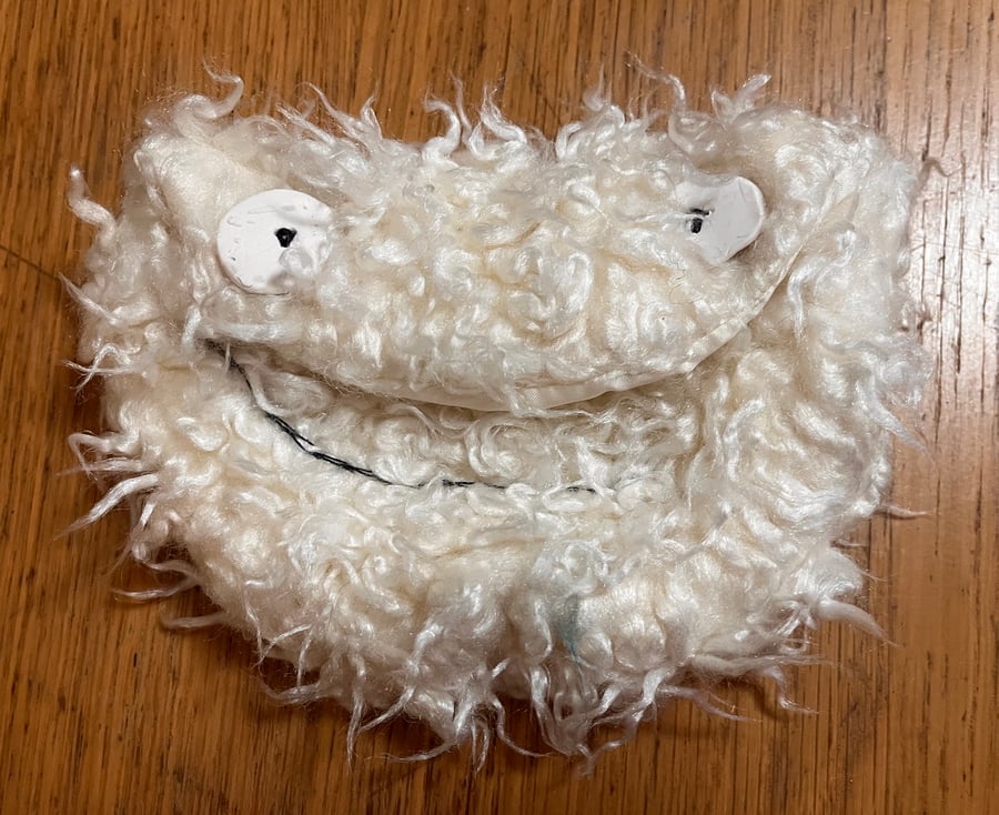 Monster head purse in faux fur with Fimo eye buttons