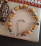 Handmade bracelet made using pre-loved beads. - Image 1