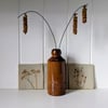 Ceramic catkins on stem, everlasting sculptural arrangement in autumnal colours