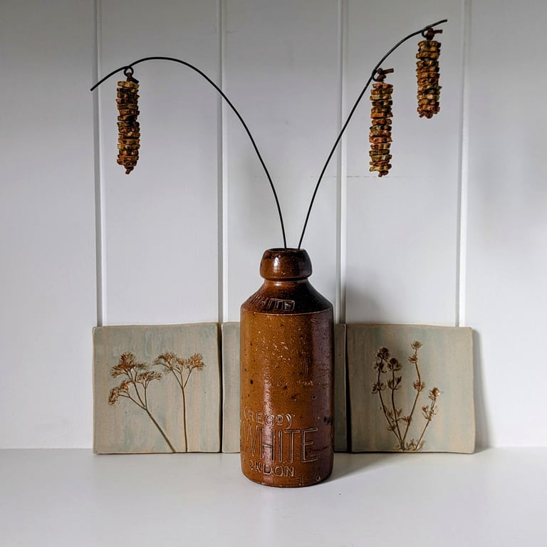 Ceramic catkins on stem, everlasting sculptural arrangement in autumnal colours