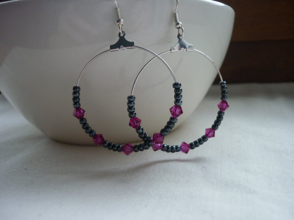 HEMATITE, FUSCHIA  AND SILVER HOOP EARRINGS. 