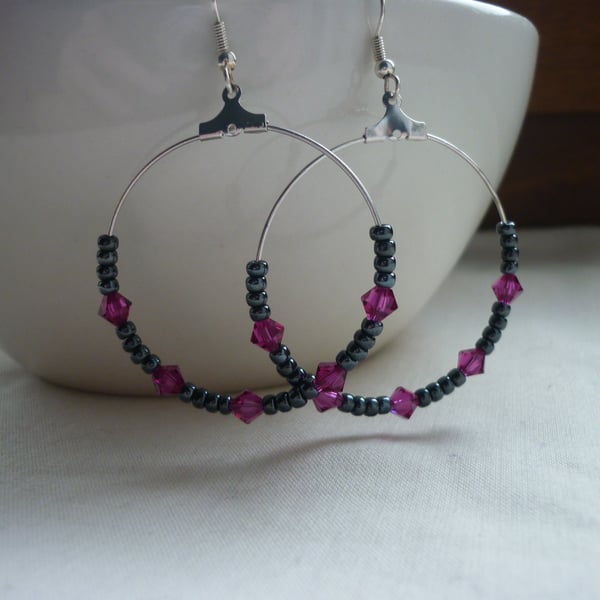 HEMATITE, FUSCHIA  AND SILVER HOOP EARRINGS. 