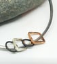Rafaela by Fedha - oxidised silver bangle with silver and copper charms - Image 3