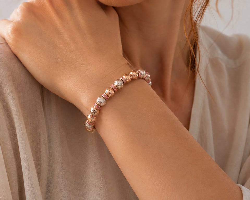 Gold coloured lava beads and pink crystal rondelles stretchy bracelet