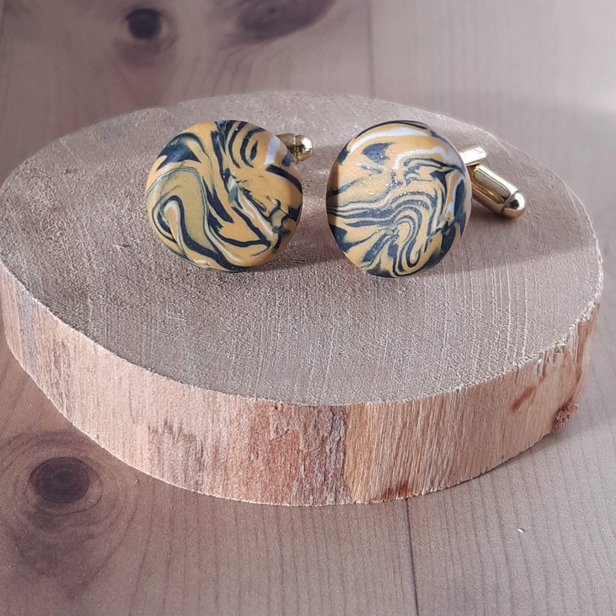 Mustard and black cufflinks