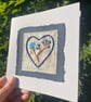Hand embroidered heart with flowers card