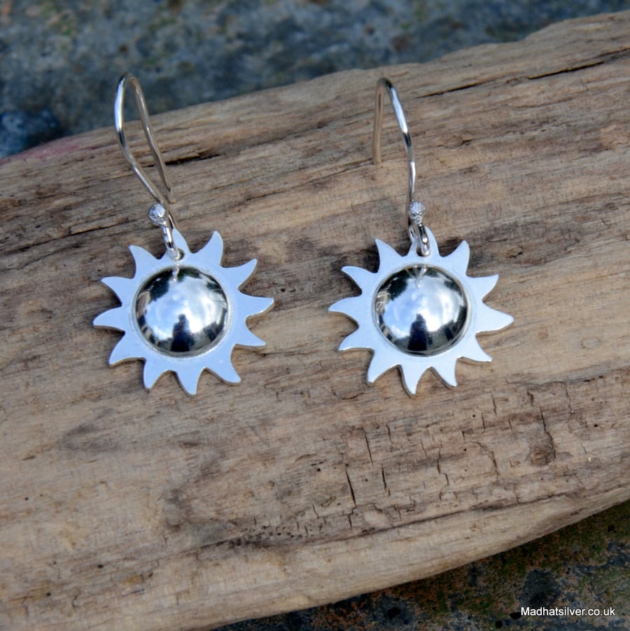 Silver sun earrings