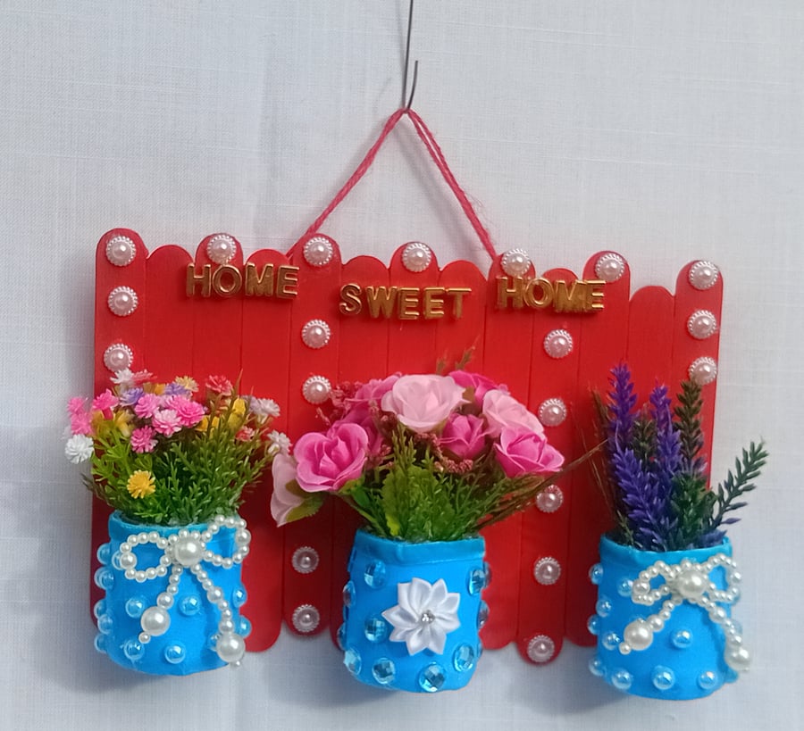 Handmade Home Sweet Home floral wall decoration.