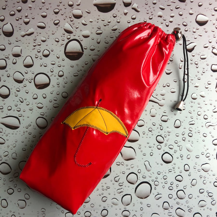Red PVC Drawstring Umbrella Bag With Yellow Applique 