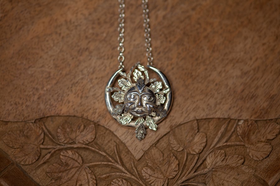Green man necklace