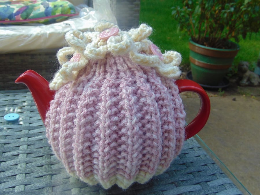 Small pink tea cosy